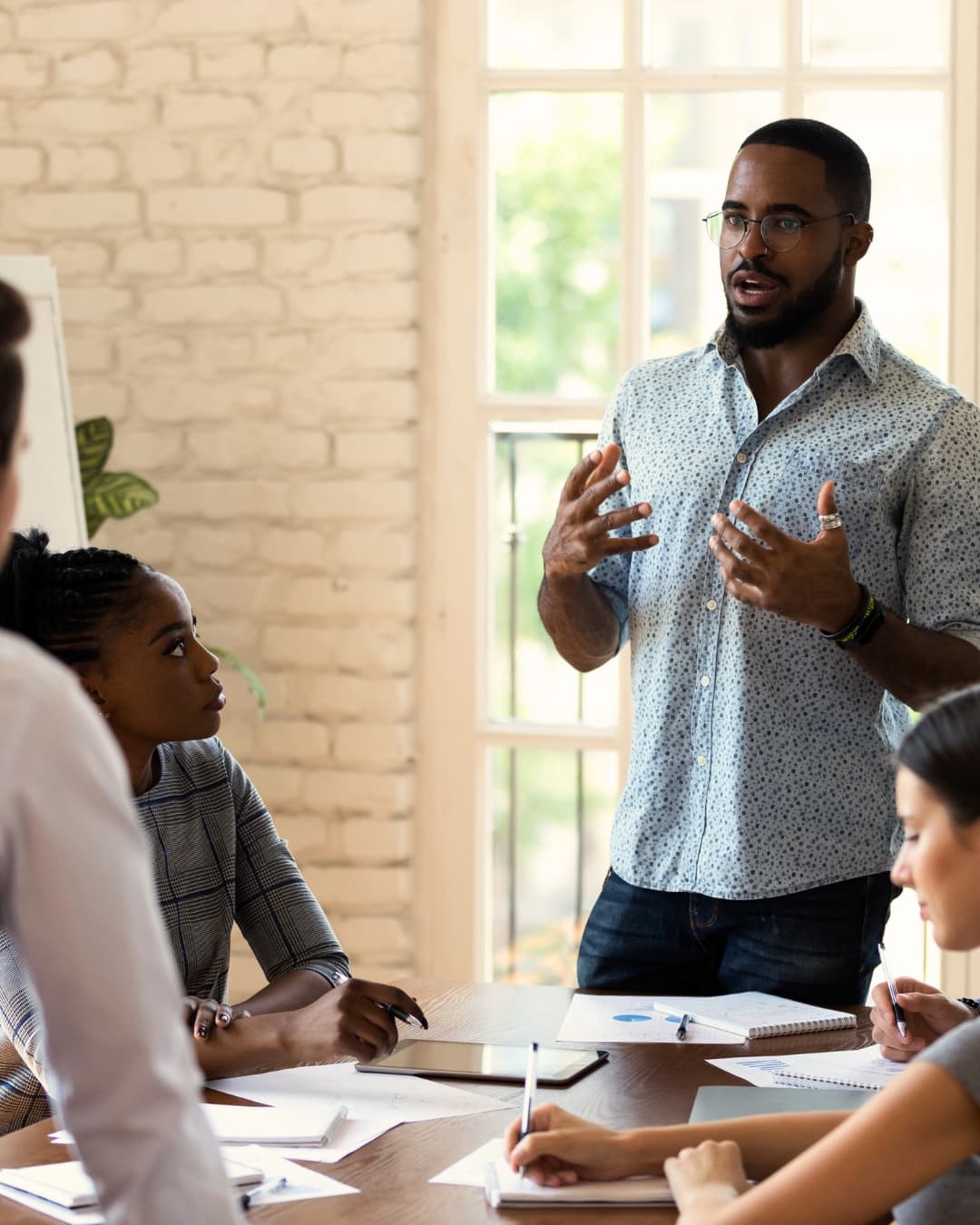 A leader presenting strategy to the team
